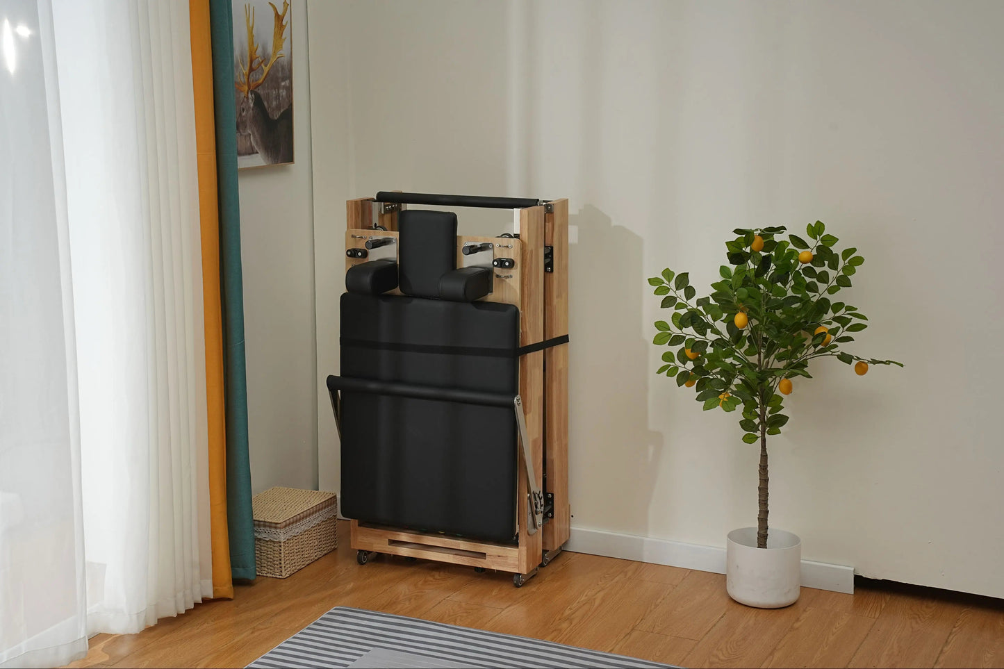 Stylish oak Pilates reformer with a foldable design for space-saving fitness.
