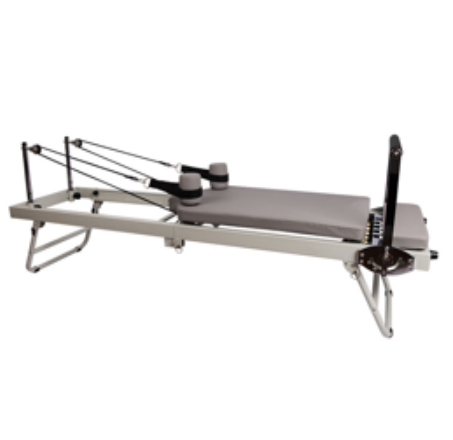 Foldable reformer with  Spring